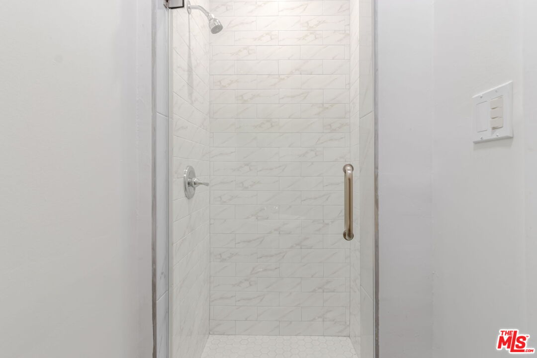 2302 Bagley Avenue Los Angeles, CA 90034 - Photo 11 of 20 a bathroom with a shower