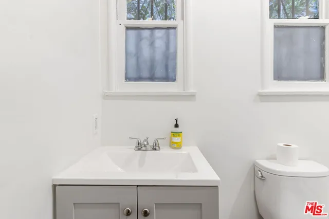 a bathroom with a sink and a toilet