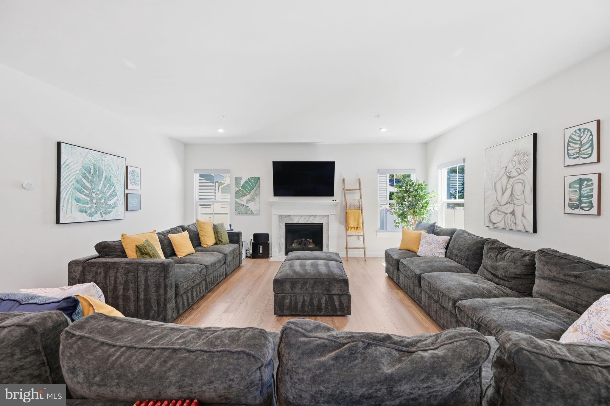 1321 Upper Patuxent Ridge Road Odenton, MD 21113 - Photo 14 of 48 Spacious living room with modern charm.