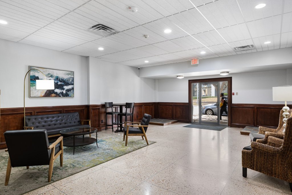 1800 Lavaca Street, Unit 207 Austin, TX 78701 - Photo 22 of 24 Lobby featuring a wainscoted wall and recessed lighting