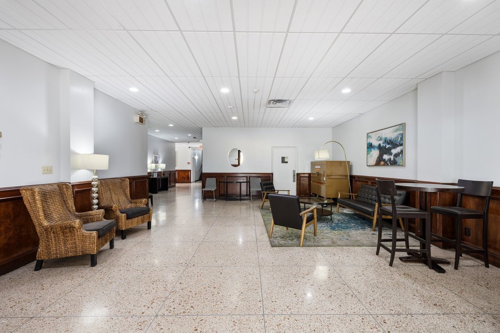 1800 Lavaca Street, Unit 207 Austin, TX 78701 - Photo 10 of 24 Common area with wainscoting and recessed lighting