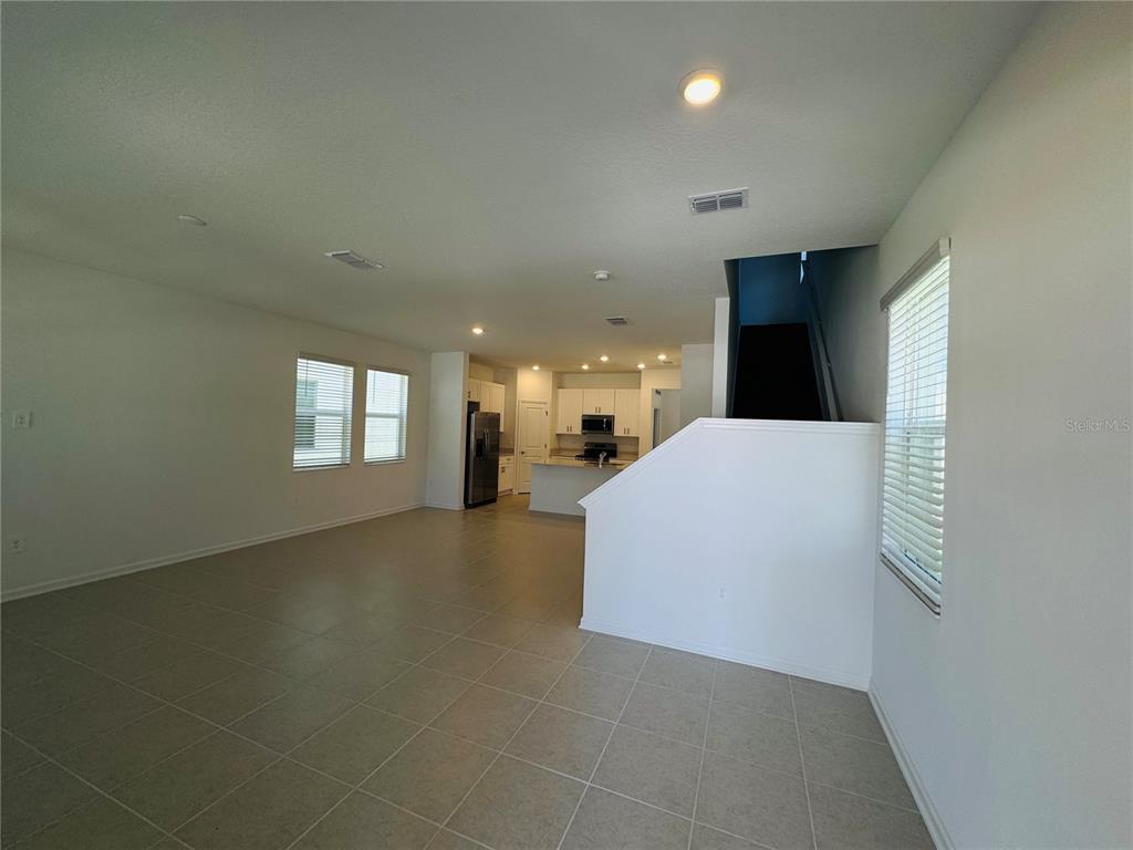 1952 Rider Rain Lane Apopka, FL 32703 - Photo 3 of 34 a view of a livingroom with a furniture