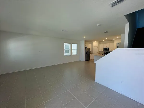 a view of a livingroom and window