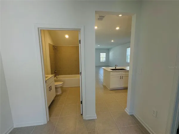 a view of a bathroom with a sink and a toilet