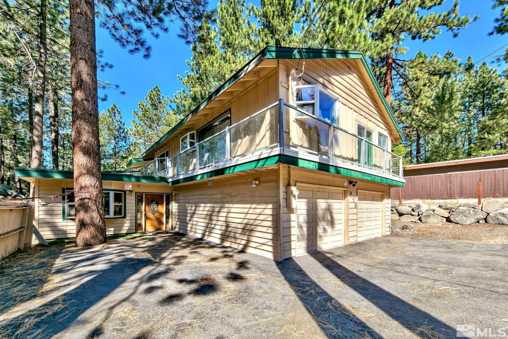 173 Juniper Drive Stateline, NV 89449 - Photo 24 of 29 a view of a house with a yard