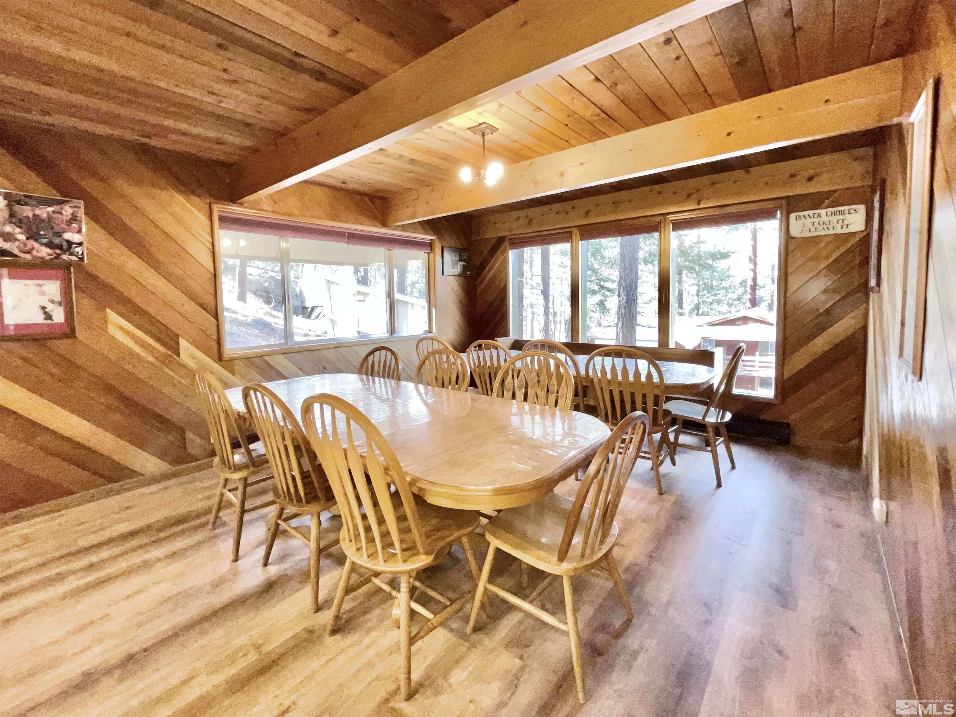 173 Juniper Drive Stateline, NV 89449 - Photo 6 of 29 a dining room with furniture and wooden floor