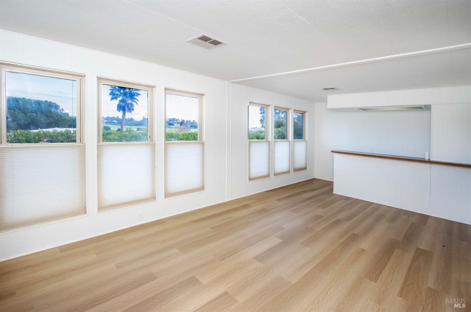 10 Fallen Leaf Way Novato, CA 94949 - Photo 1 of 30 a view of empty room with wooden floor and fan