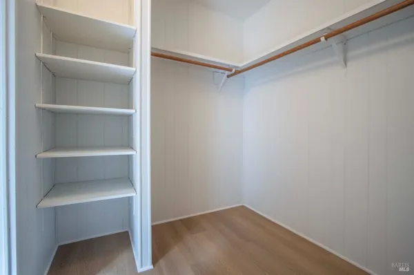 a view of an empty walk in closet
