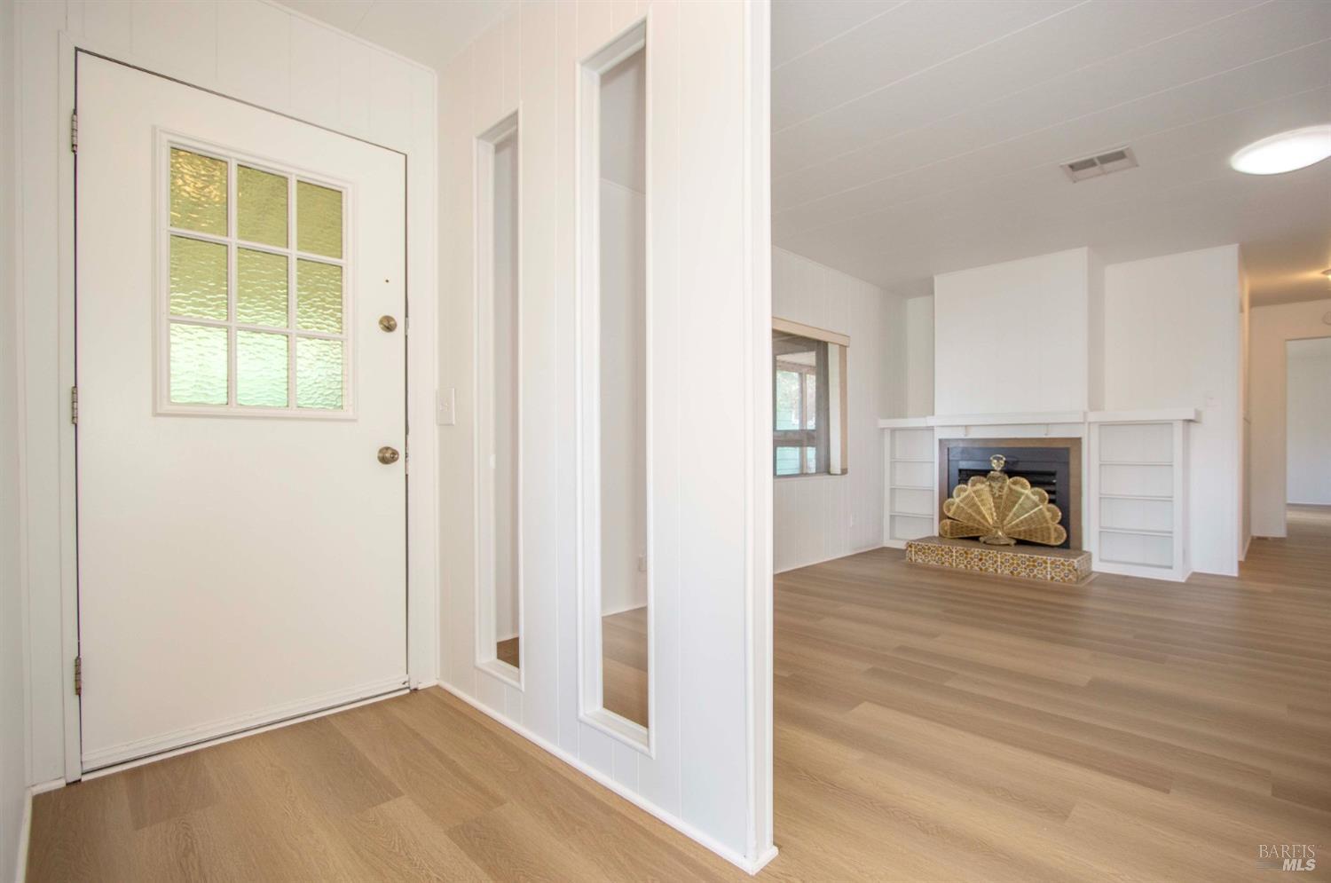 10 Fallen Leaf Way Novato, CA 94949 - Photo 19 of 30 a view of empty room with window and wooden floor