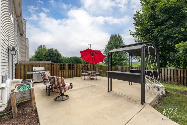 a view of a chairs and tables in the patio