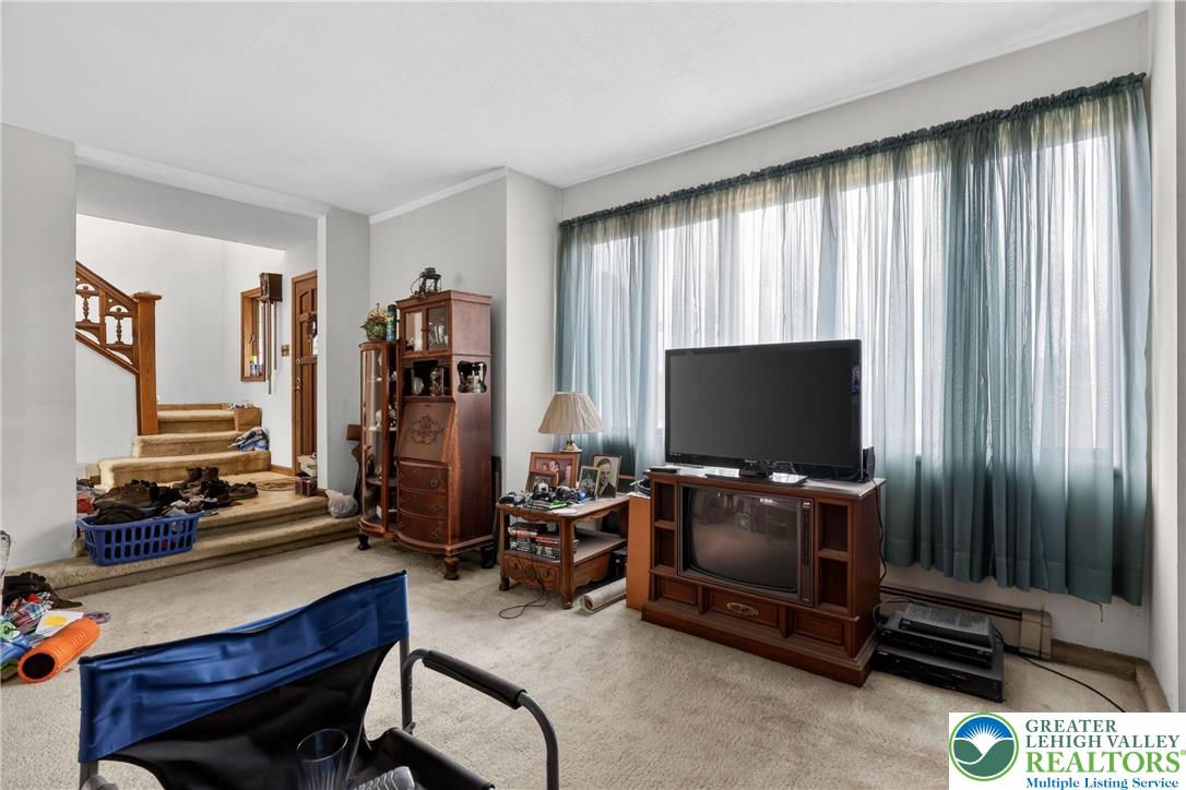 650 Chapman Lake Road Scott Township, PA 18433 - Photo 14 of 52 a living room with furniture and a flat screen tv