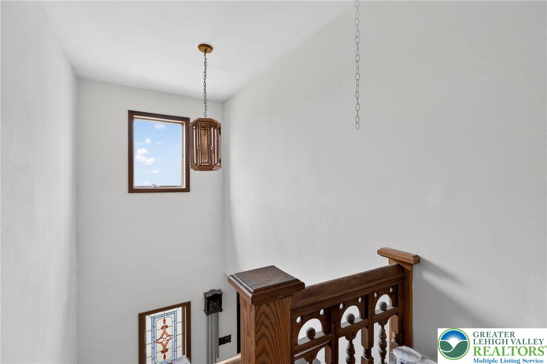 650 Chapman Lake Road Scott Township, PA 18433 - Photo 20 of 52 a hallway with chairs and wooden floor