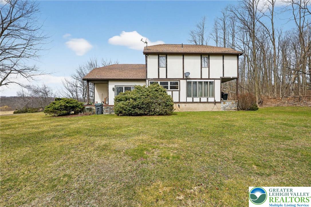 650 Chapman Lake Road Scott Township, PA 18433 - Photo 2 of 52 a view of a house with backyard and garden