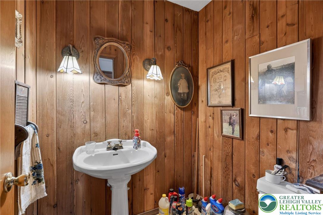 650 Chapman Lake Road Scott Township, PA 18433 - Photo 24 of 52 a bathroom with a sink and a mirror