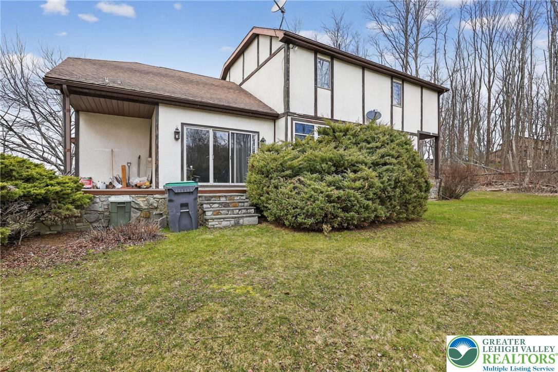 650 Chapman Lake Road Scott Township, PA 18433 - Photo 3 of 52 a view of a house with backyard and garden