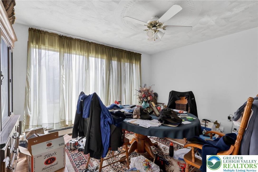 650 Chapman Lake Road Scott Township, PA 18433 - Photo 35 of 52 a room with furniture a rug and a window