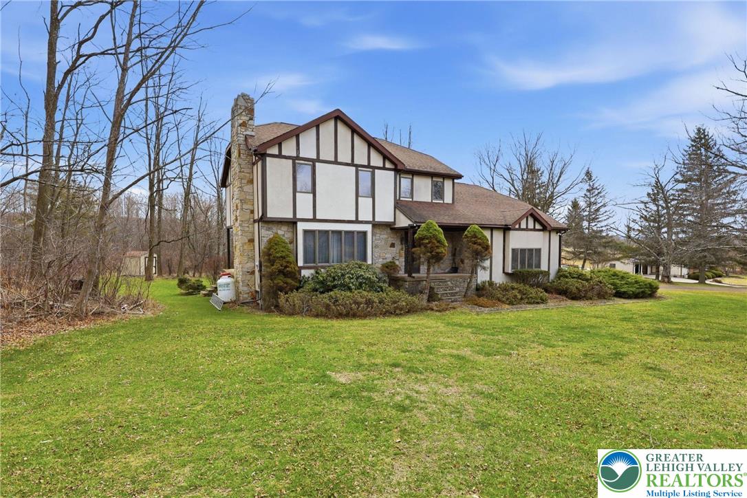650 Chapman Lake Road Scott Township, PA 18433 - Photo 4 of 52 a view of a house with a yard