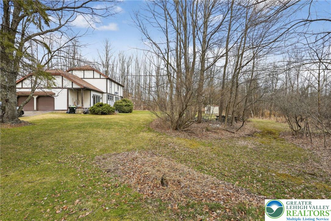 650 Chapman Lake Road Scott Township, PA 18433 - Photo 46 of 52 a view of a yard with a house