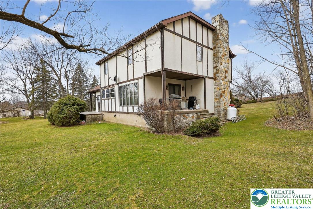 650 Chapman Lake Road Scott Township, PA 18433 - Photo 7 of 52 a view of a house with a big yard
