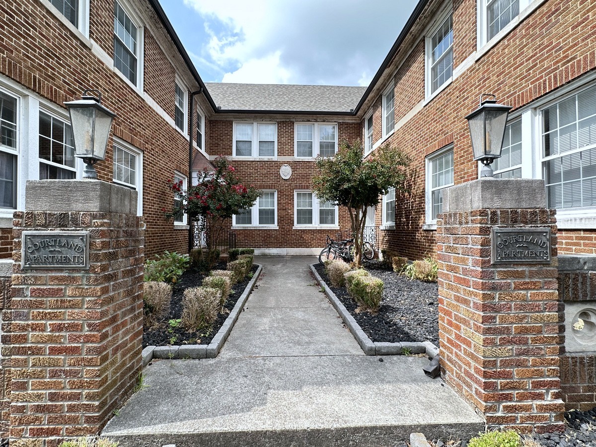 610 North 2nd Street, Unit 8 Clarksville, TN 37040 - Photo 2 of 29 a view of a building with brick walls