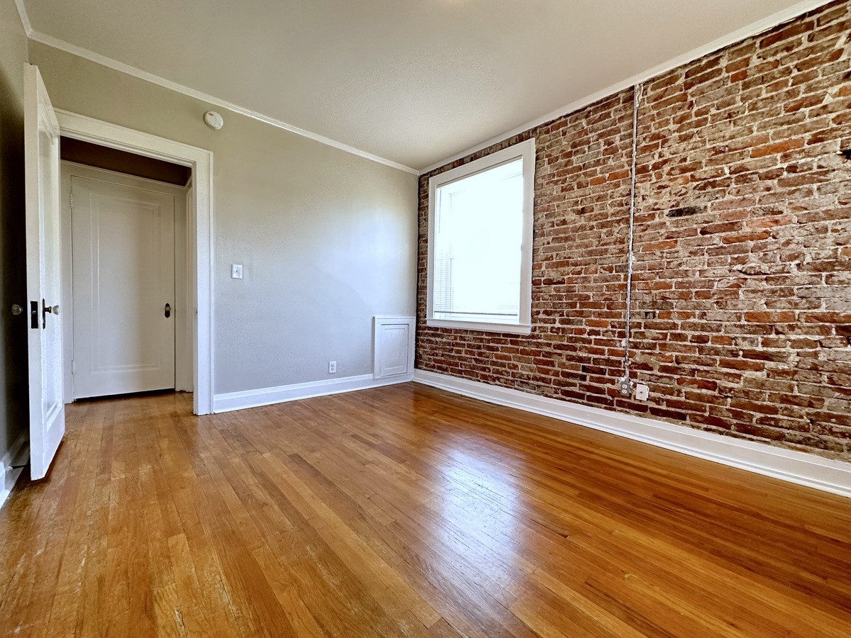 610 North 2nd Street, Unit 8 Clarksville, TN 37040 - Photo 25 of 29 a view of an empty room and wooden floor