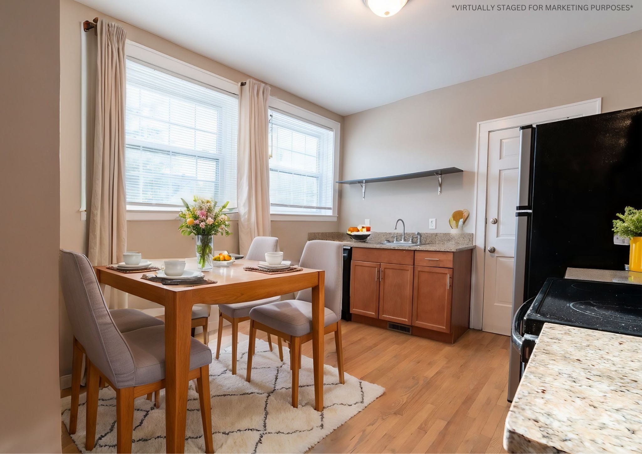 610 North 2nd Street, Unit 8 Clarksville, TN 37040 - Photo 8 of 29 a kitchen with a table and chairs in it