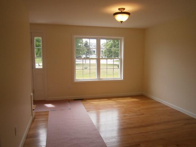 9 Knoll Top Road Forestdale, MA 02644 - Photo 7 of 16 a view of an empty room with a window and wooden floor