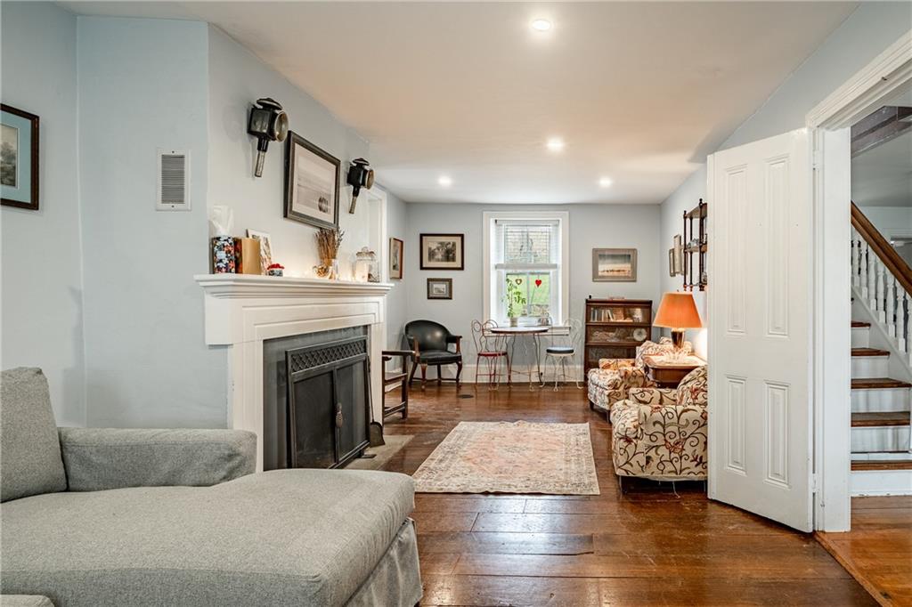 701 Oakbourne Road West Chester, PA 19382 - Photo 9 of 50 a living room with furniture and a fireplace
