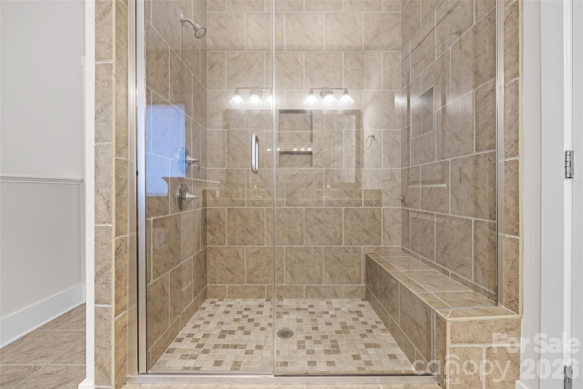 12039 Spinnaker Drive Tega Cay, SC 29708 - Photo 17 of 48 a bathroom with a shower