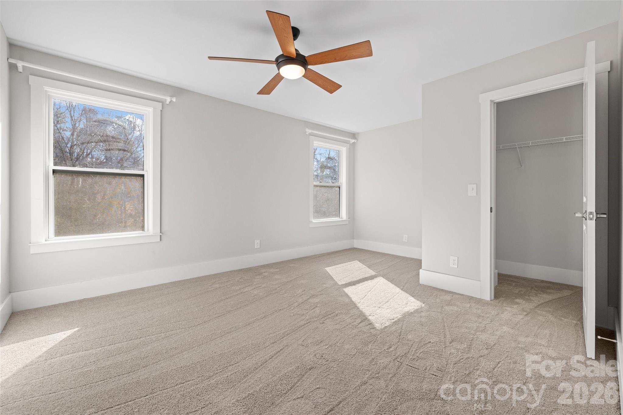 12039 Spinnaker Drive Tega Cay, SC 29708 - Photo 22 of 48 a view of an empty room with a window