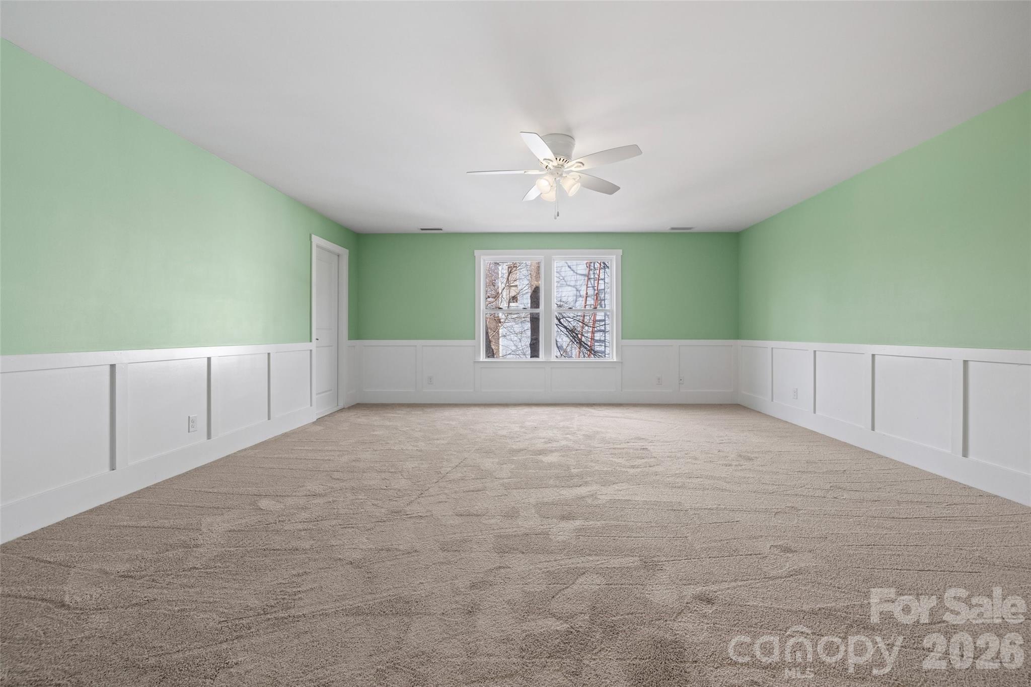 12039 Spinnaker Drive Tega Cay, SC 29708 - Photo 26 of 48 a view of an empty room with a window