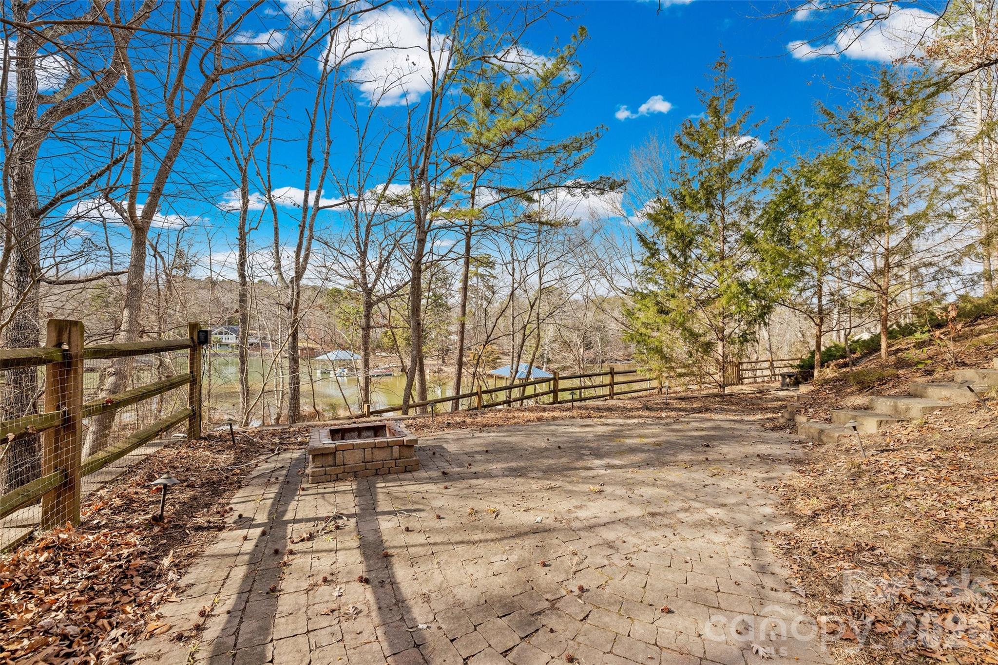 12039 Spinnaker Drive Tega Cay, SC 29708 - Photo 42 of 48 a view of a backyard of the house