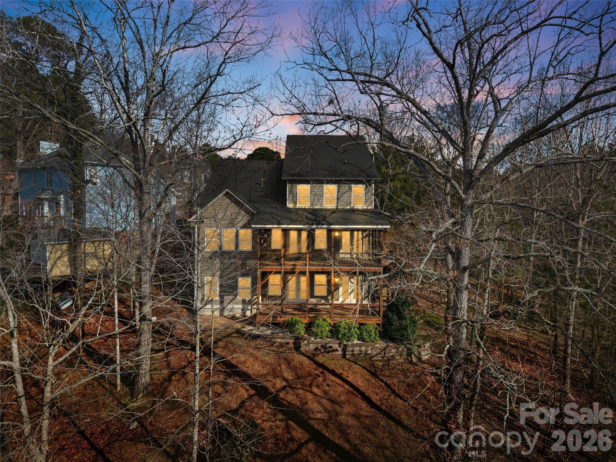 12039 Spinnaker Drive Tega Cay, SC 29708 - Photo 47 of 48 a front view of a house with a yard