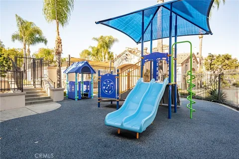 a view of a chair and table in the patio