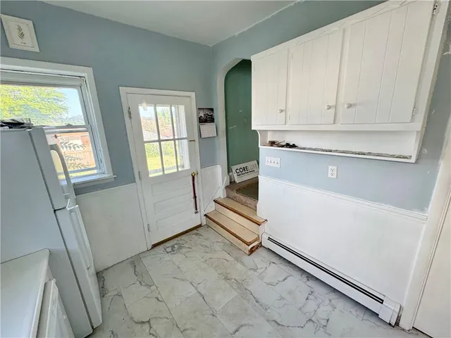 a view of an empty room and window