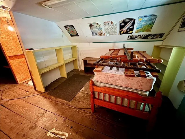 a view of a chairs and table in a room
