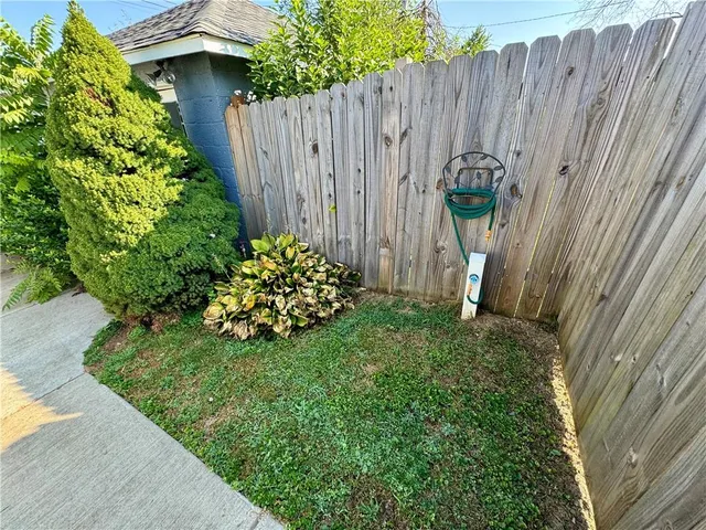 a view of a backyard with plants
