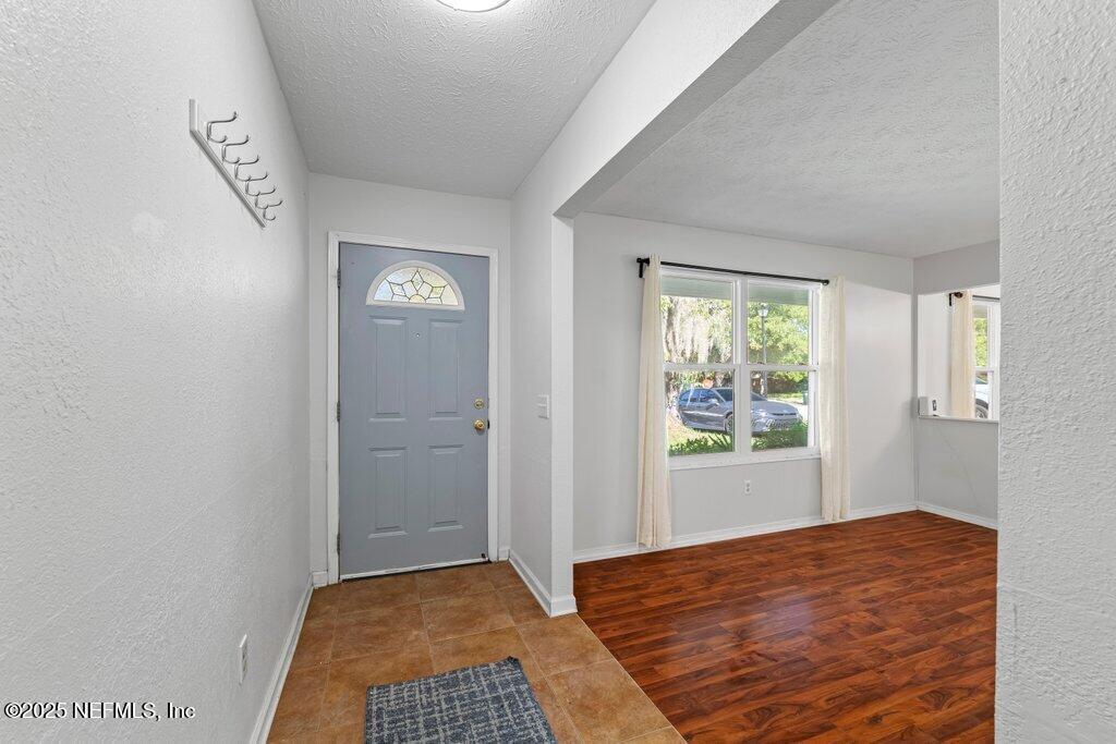 11631 East Ride Drive Jacksonville, FL 32223 - Photo 22 of 28 a view of an empty room and window