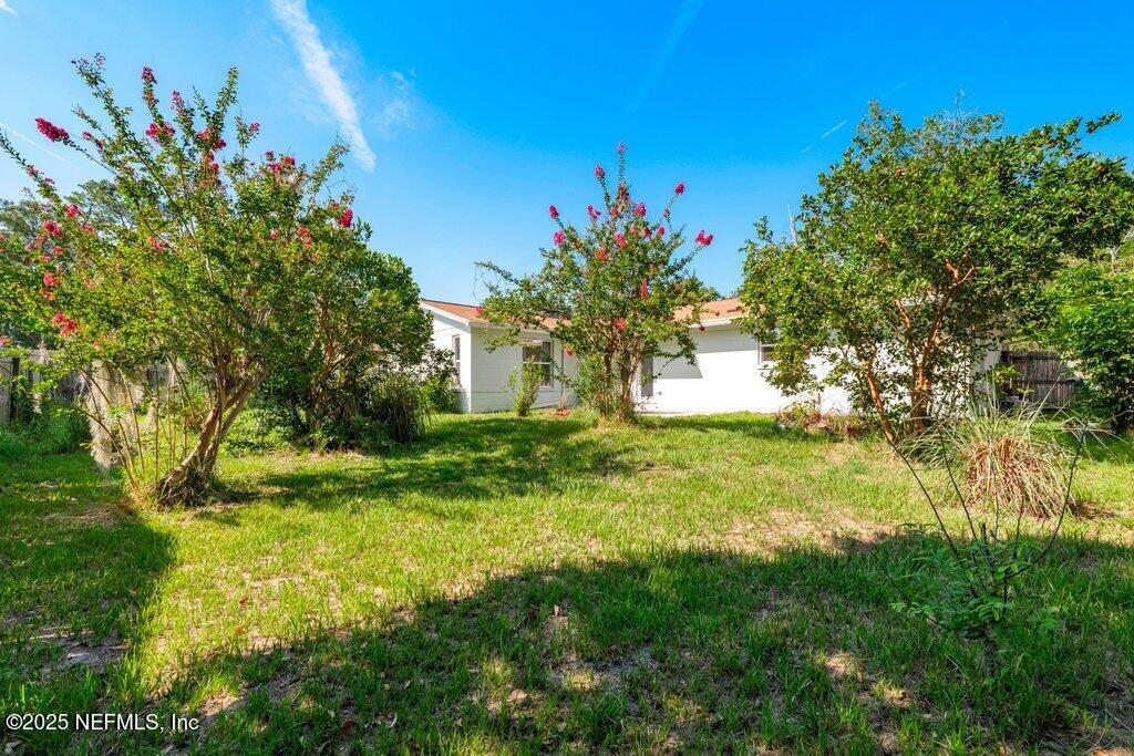 11631 East Ride Drive Jacksonville, FL 32223 - Photo 26 of 28 a view of a yard