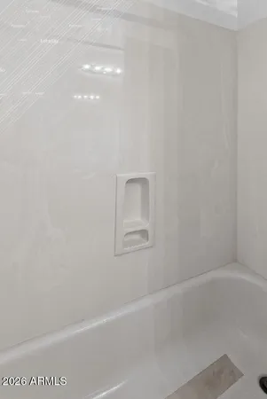 a bathroom with a bathtub