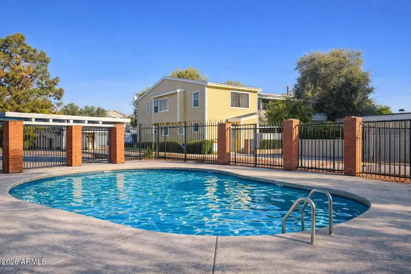 a view of a house with wooden floor and a yard