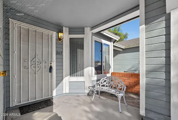 a balcony with chairs and outdoor space