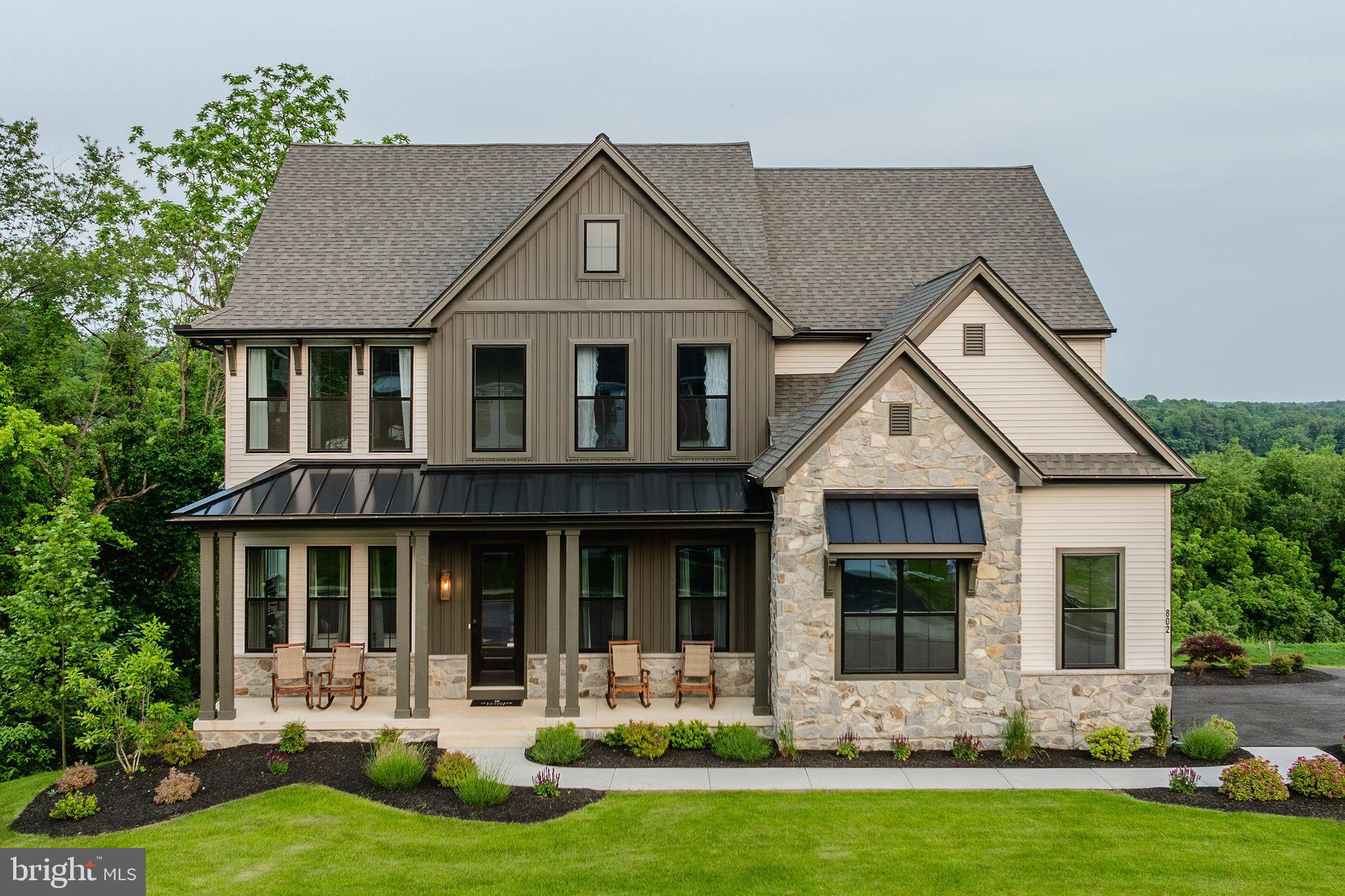 610 East Tolna Road, Unit HAWTHORNE Shrewsbury, PA 17361 - Photo 2 of 42 front view of a house with a yard