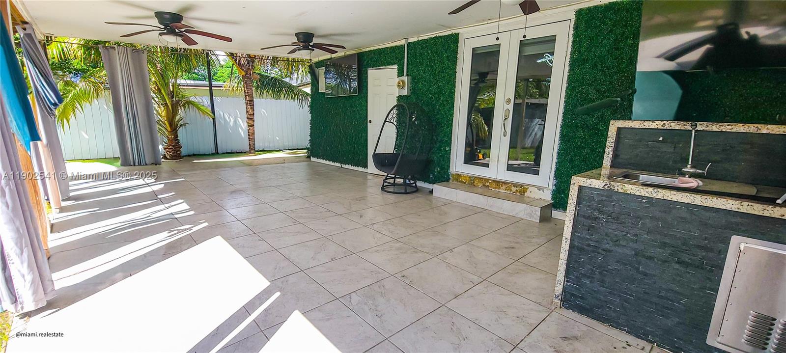 232 Northeast 160th Street Miami, FL 33162 - Photo 27 of 36 a view of a garden