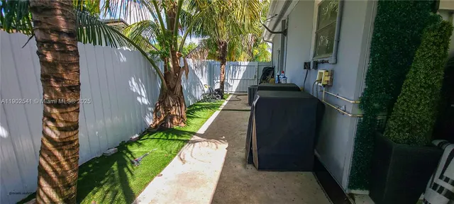 a backyard of a house with a yard