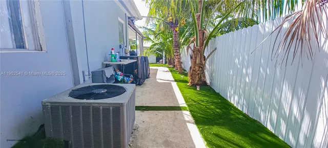 a house view with a garden space