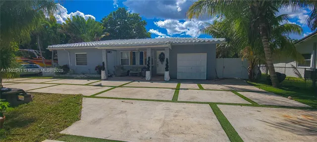 a house with palm tree in front of it