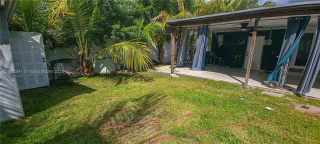 a view of a backyard with garden