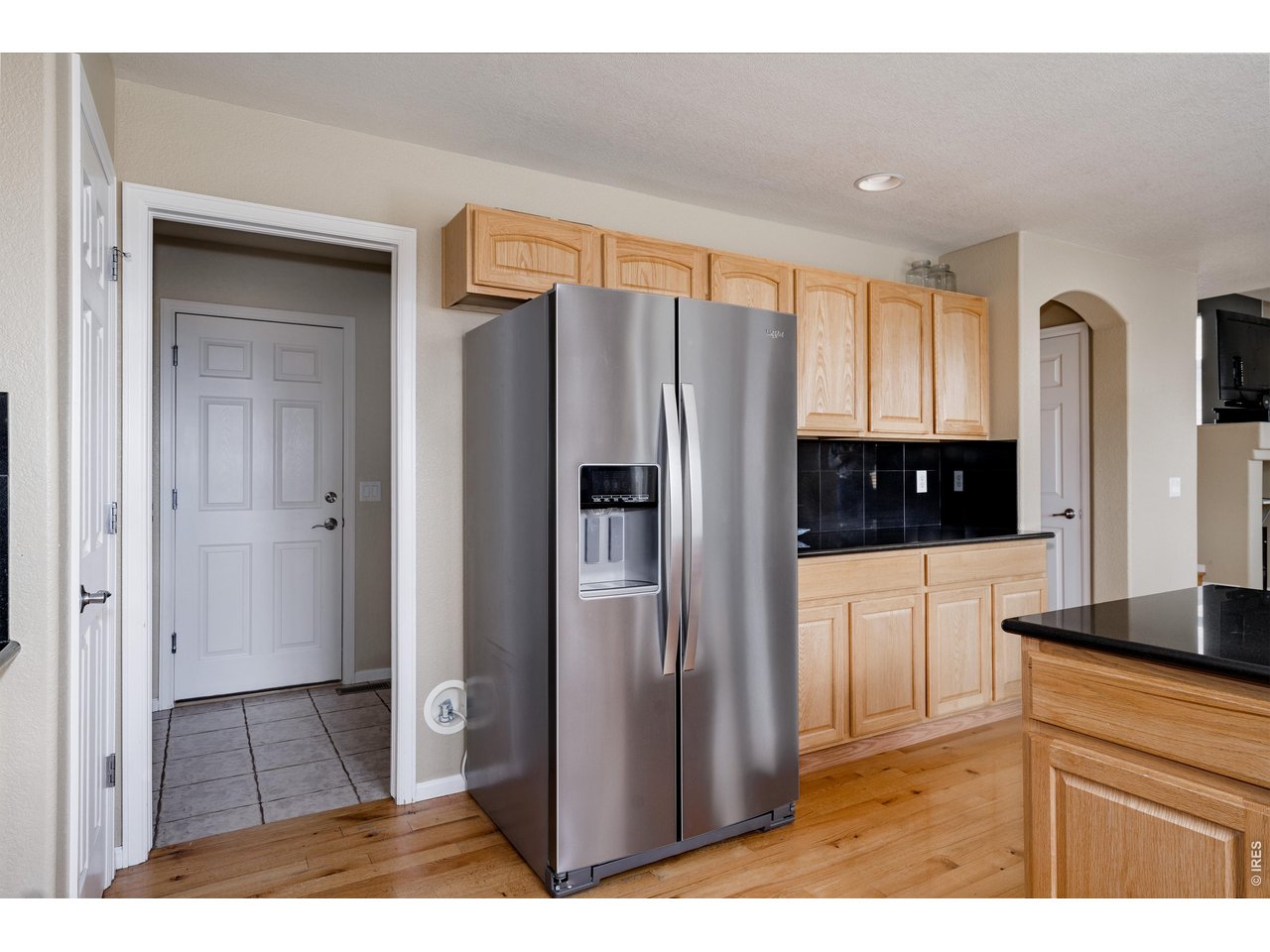 34 Saxony Road Johnstown, CO 80534 - Photo 19 of 49 Kitchen looking into laundry room