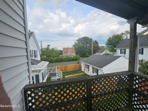 a view of houses with roof deck